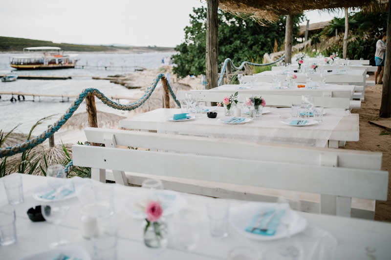 tables set up and the beach